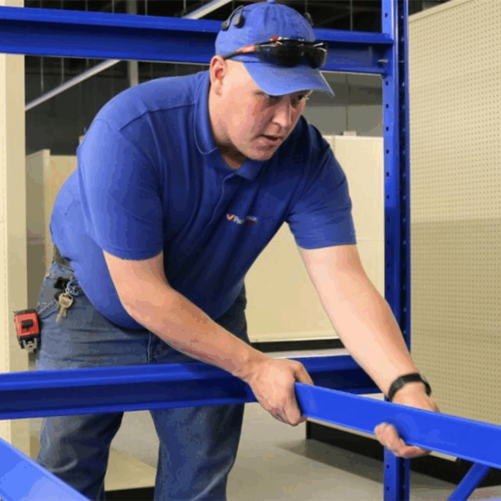 Retail team assisting with stockroom organization during post-holiday retail assessments